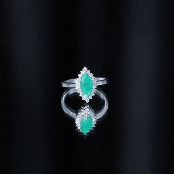 Elongated Marquise Cut Emerald Engagement Ring with Diamond Halo