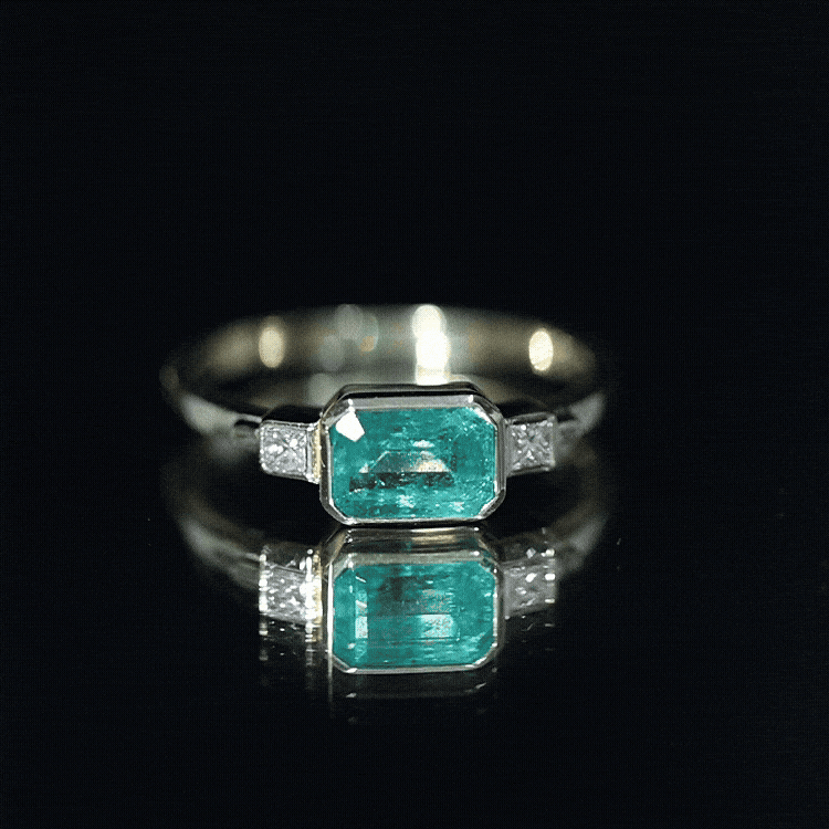 Octagon shape Emerald and Diamond East-West Promise Ring in Bezel Setting