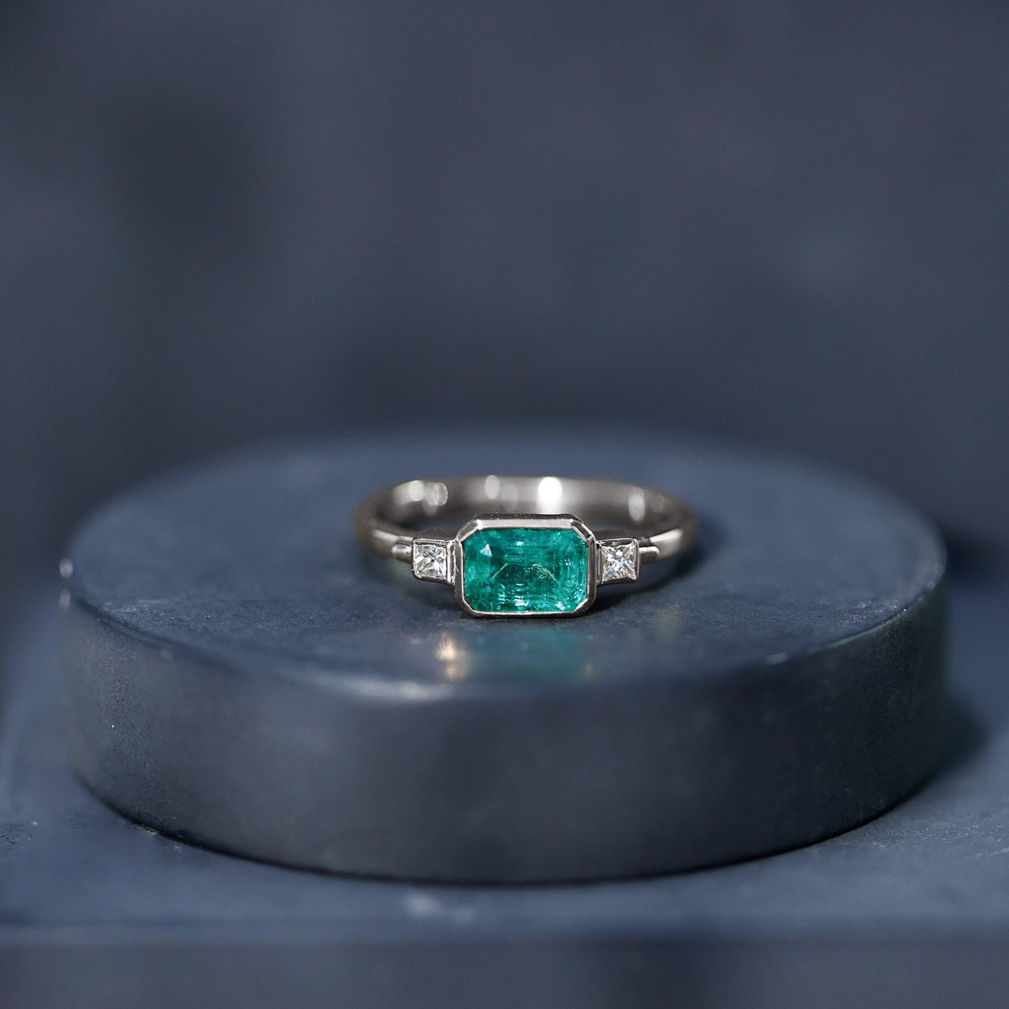 Octagon shape Emerald and Diamond East-West Promise Ring in Bezel Setting