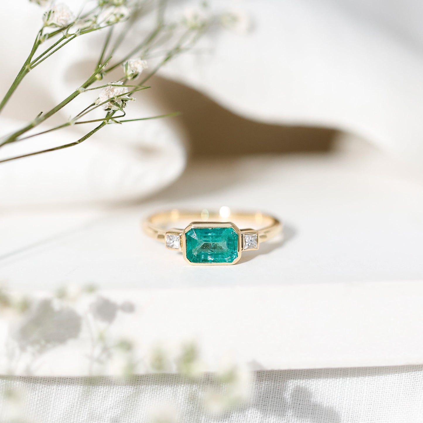 Octagon shape Emerald and Diamond East-West Promise Ring in Bezel Setting