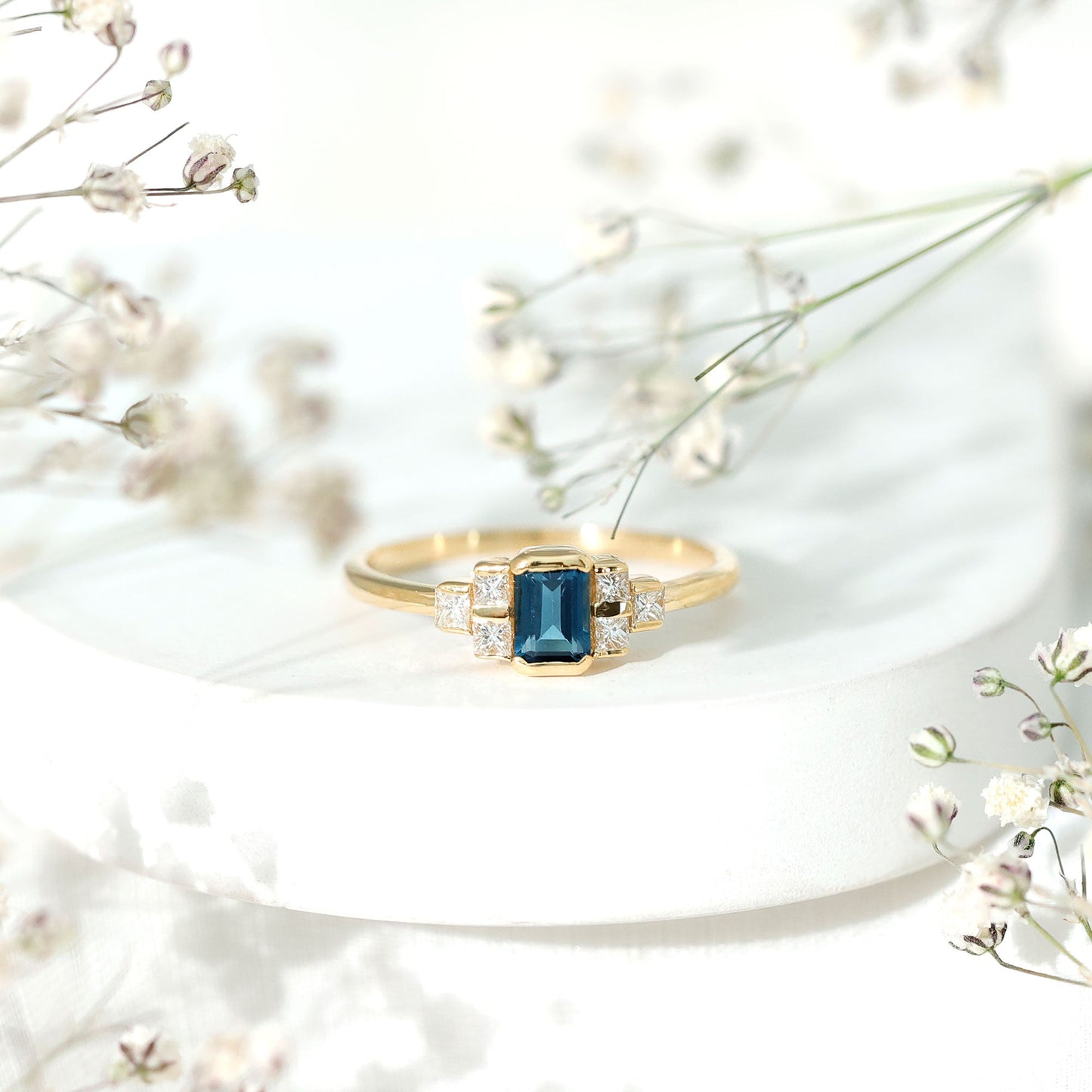 0.7 Carat Emerald Cut London Blue Topaz Statement Ring with Diamond
