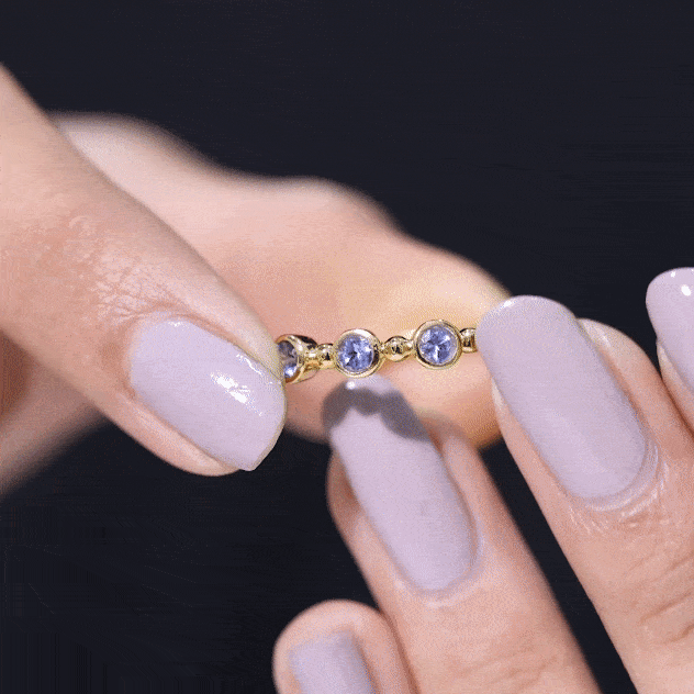 Natural Tanzanite Half Eternity Ring in Bezel Setting