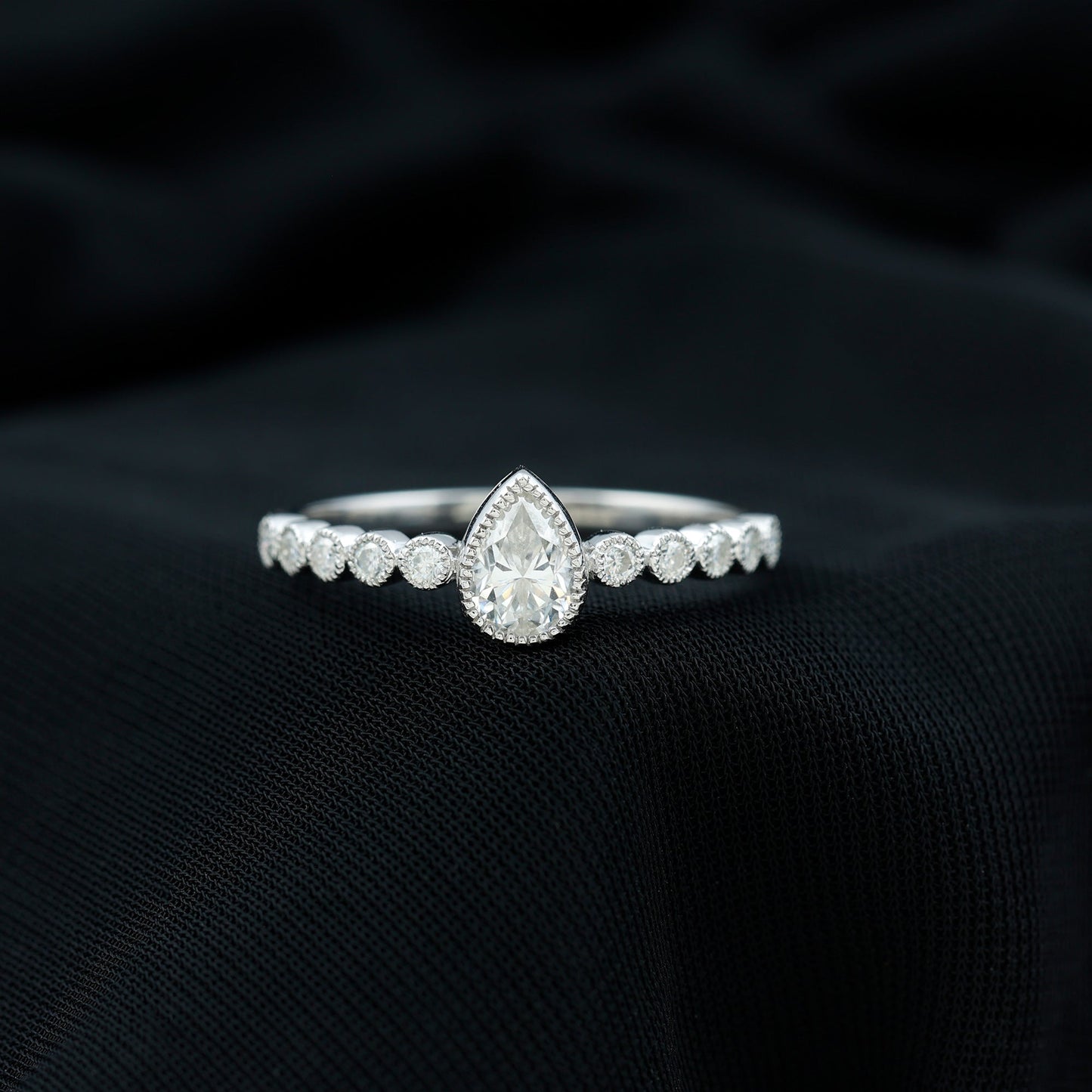 Lab Grown Diamond 0.6 Carat Pear Shaped Engagement Ring With Side Stones