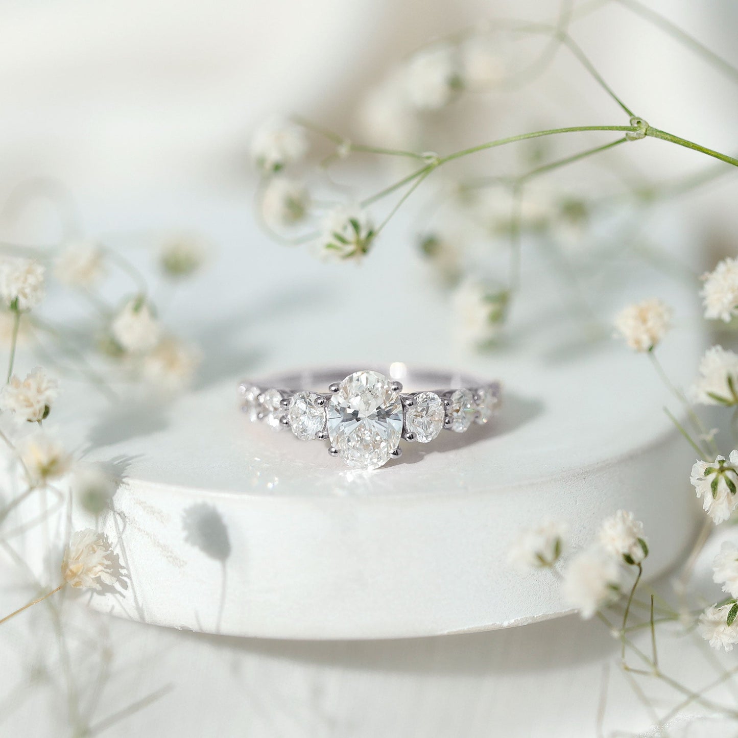 Lab Grown 1.2 Carat Diamond Oval Engagement Ring With Side Stones