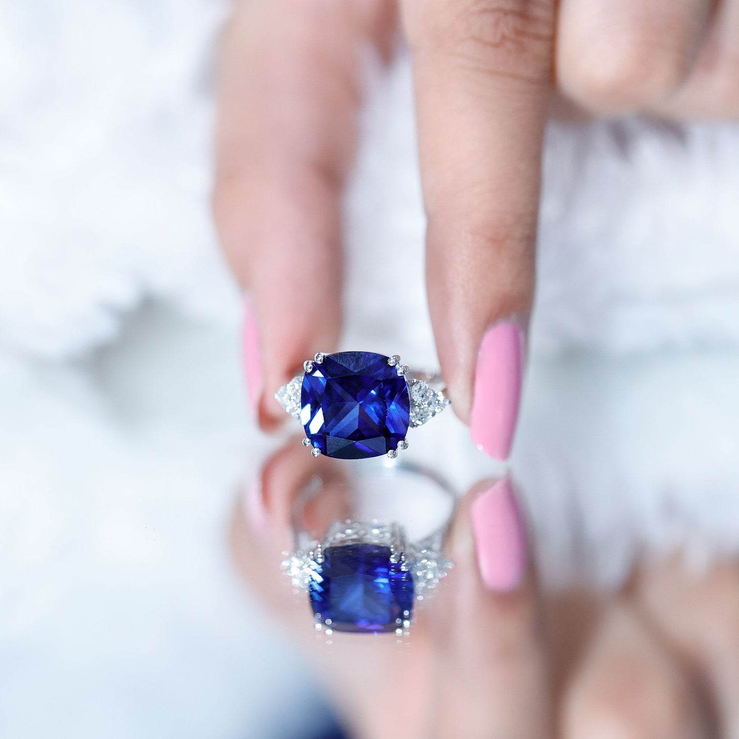Certified 9 Carat Lab Grown Blue Sapphire Cushion Cut Engagement Ring with Diamond Trio