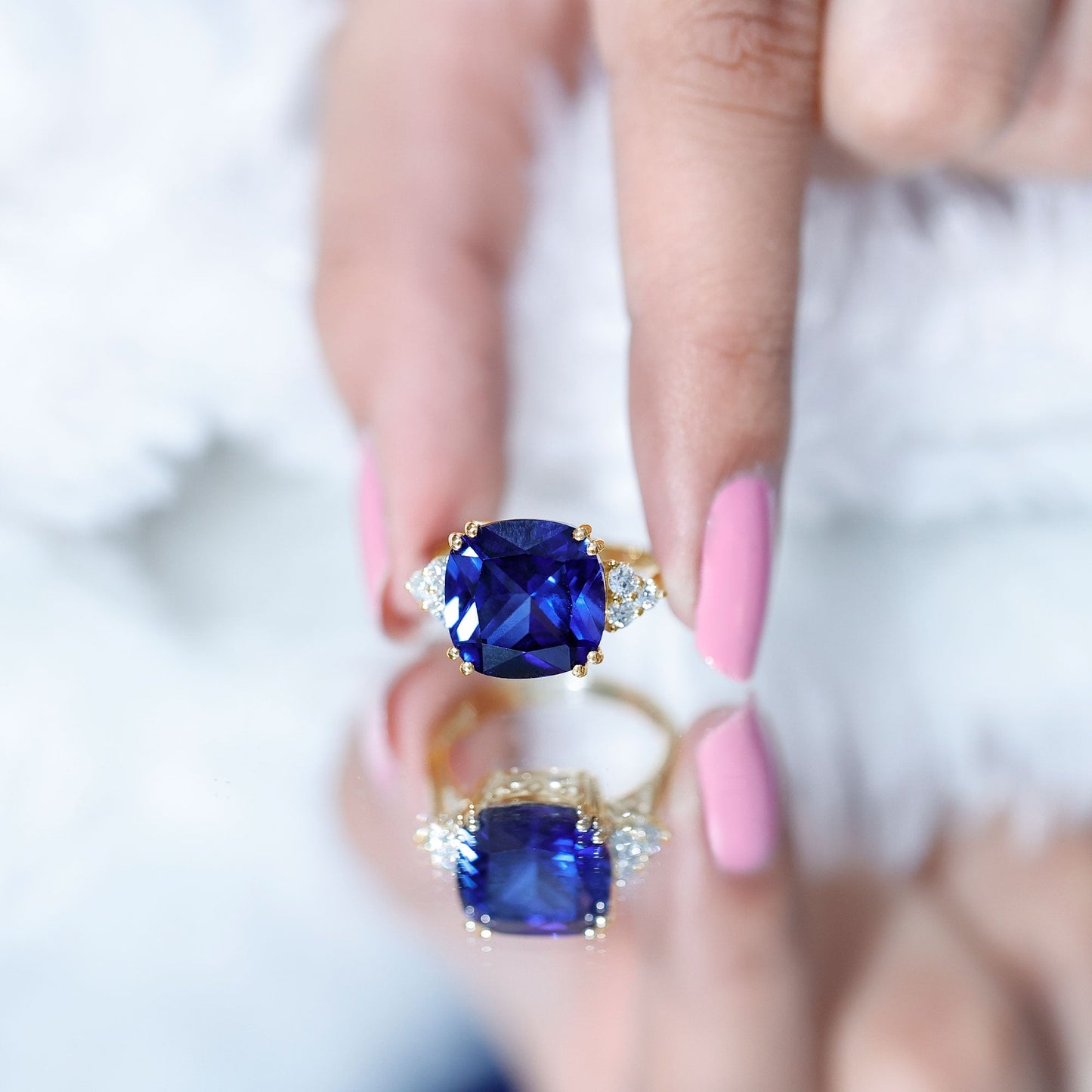 Certified 9 Carat Lab Grown Blue Sapphire Cushion Cut Engagement Ring with Diamond Trio