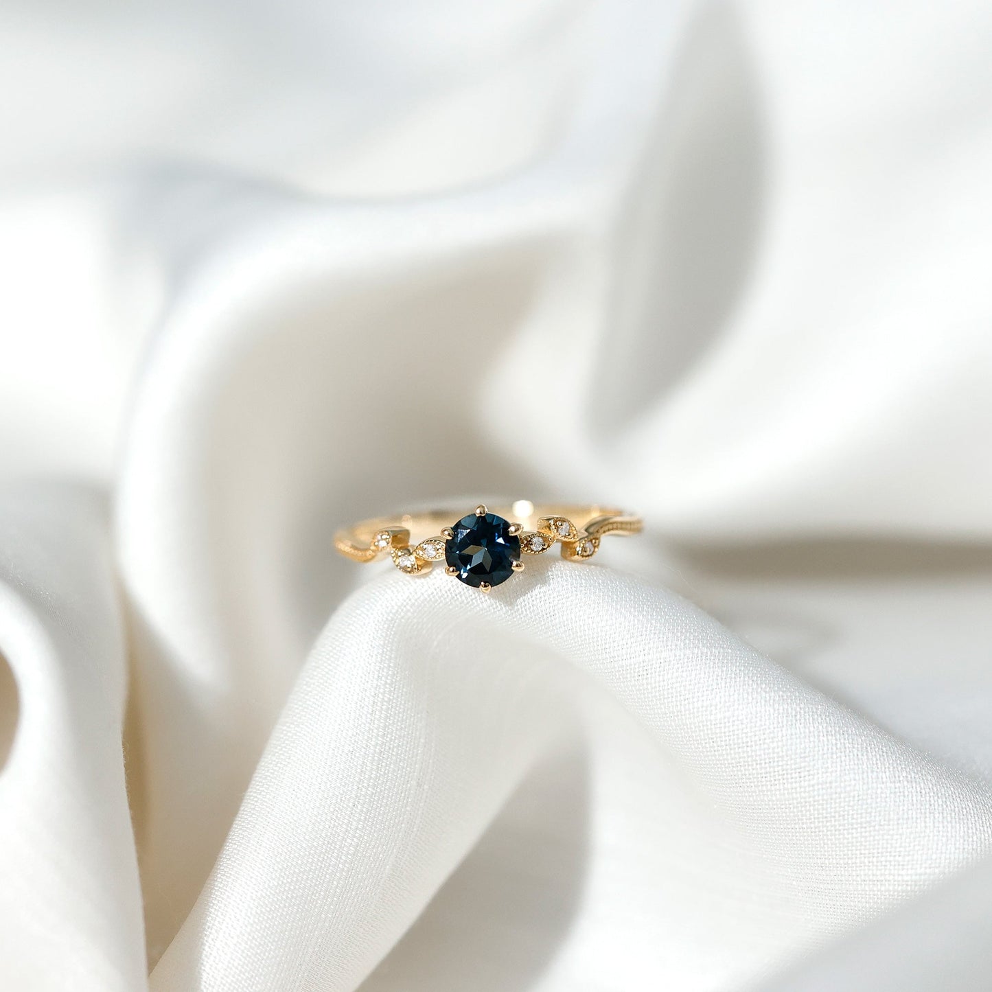 0.6 Carat Round London Blue Topaz Commitment Ring with Diamond
