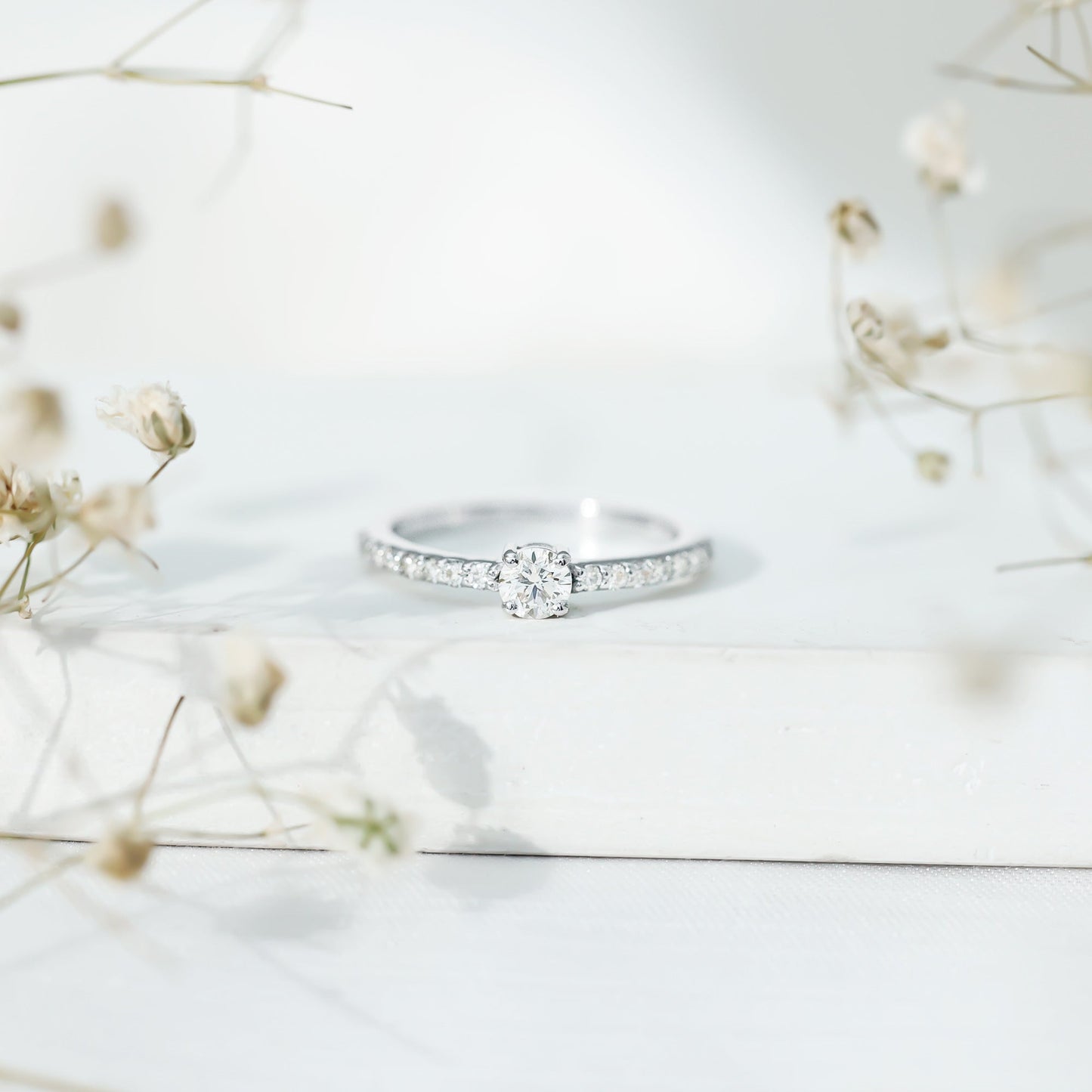 Round Diamond Solitaire Ring with Side Stones