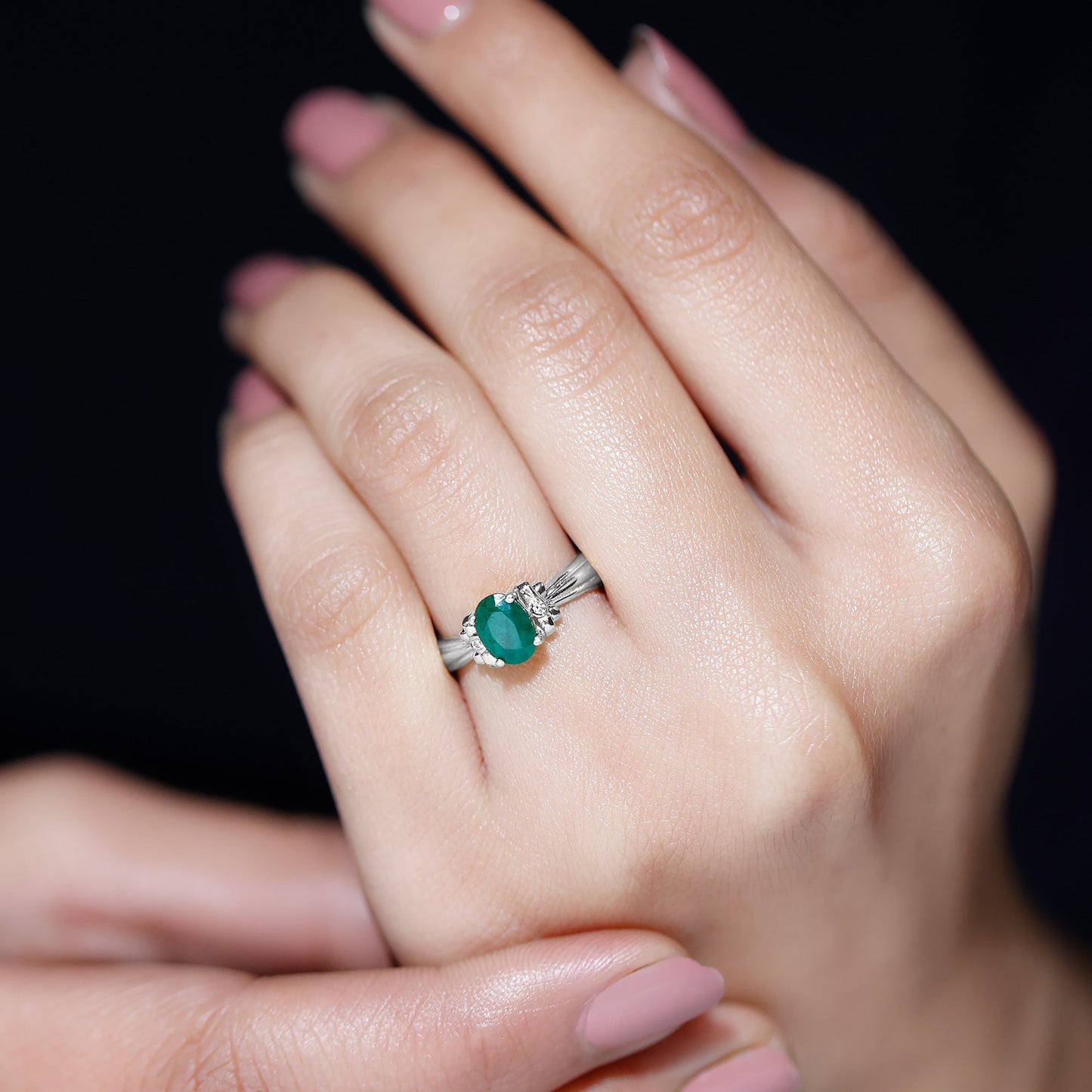 Oval Cut Emerald Solitaire Engagement Ring with Bow Design