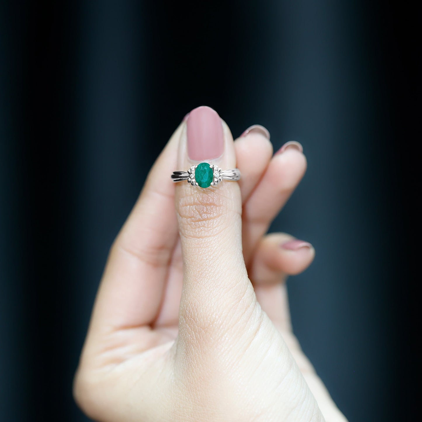 Oval Cut Emerald Solitaire Engagement Ring with Bow Design