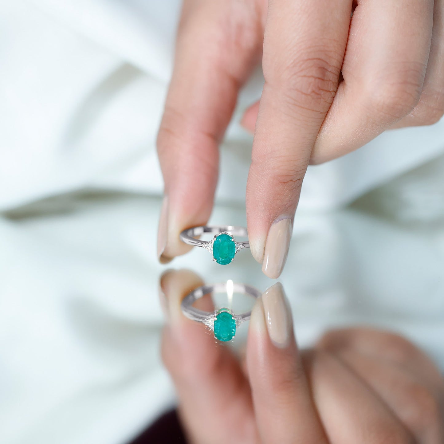 Solitaire Oval Emerald Engagement Ring with Diamonds