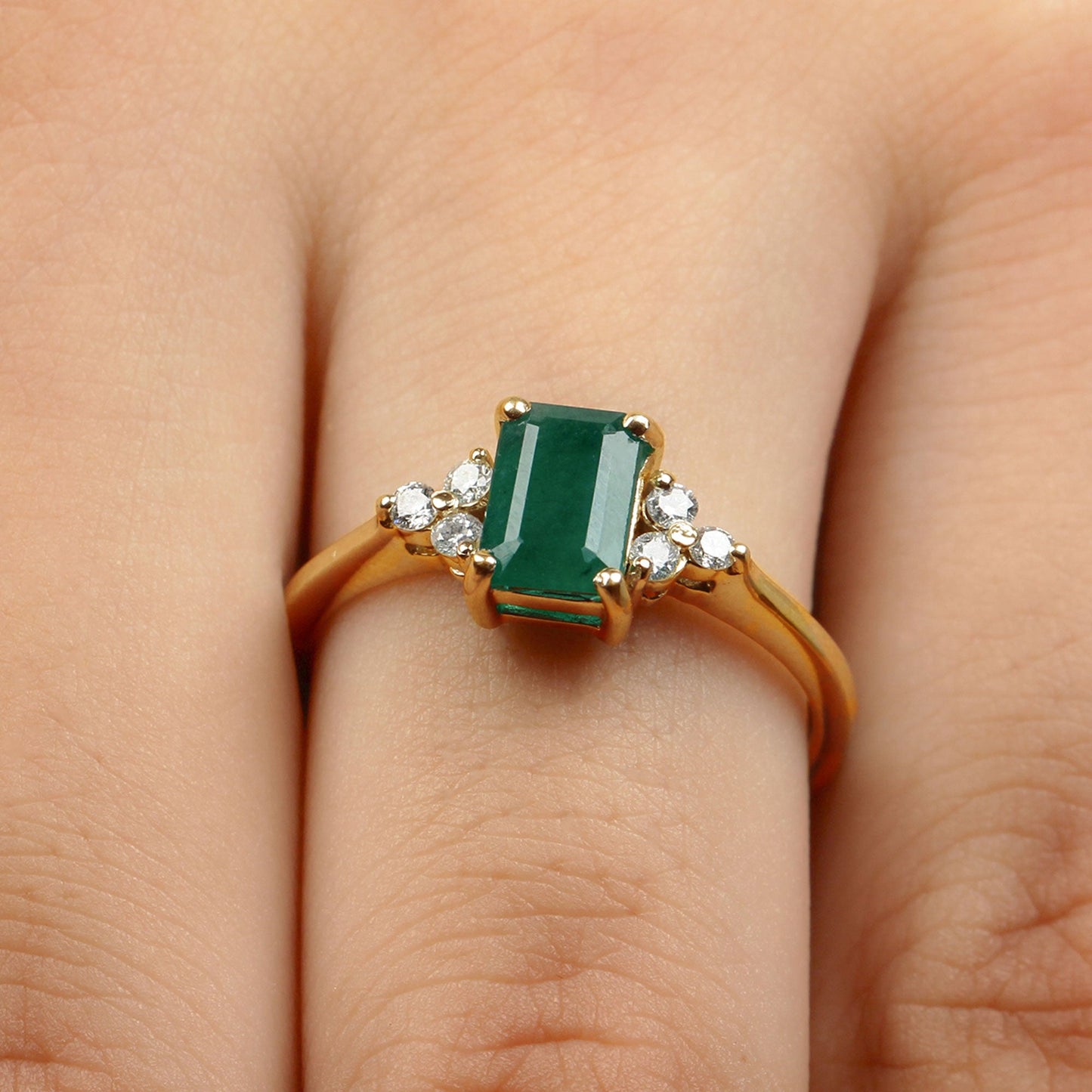 Octagon Cut Emerald Engagement Ring with Diamond Trio