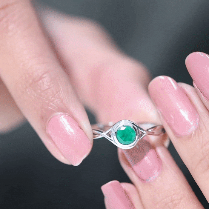 Round Cut Emerald Solitaire Ring with Crossover Band