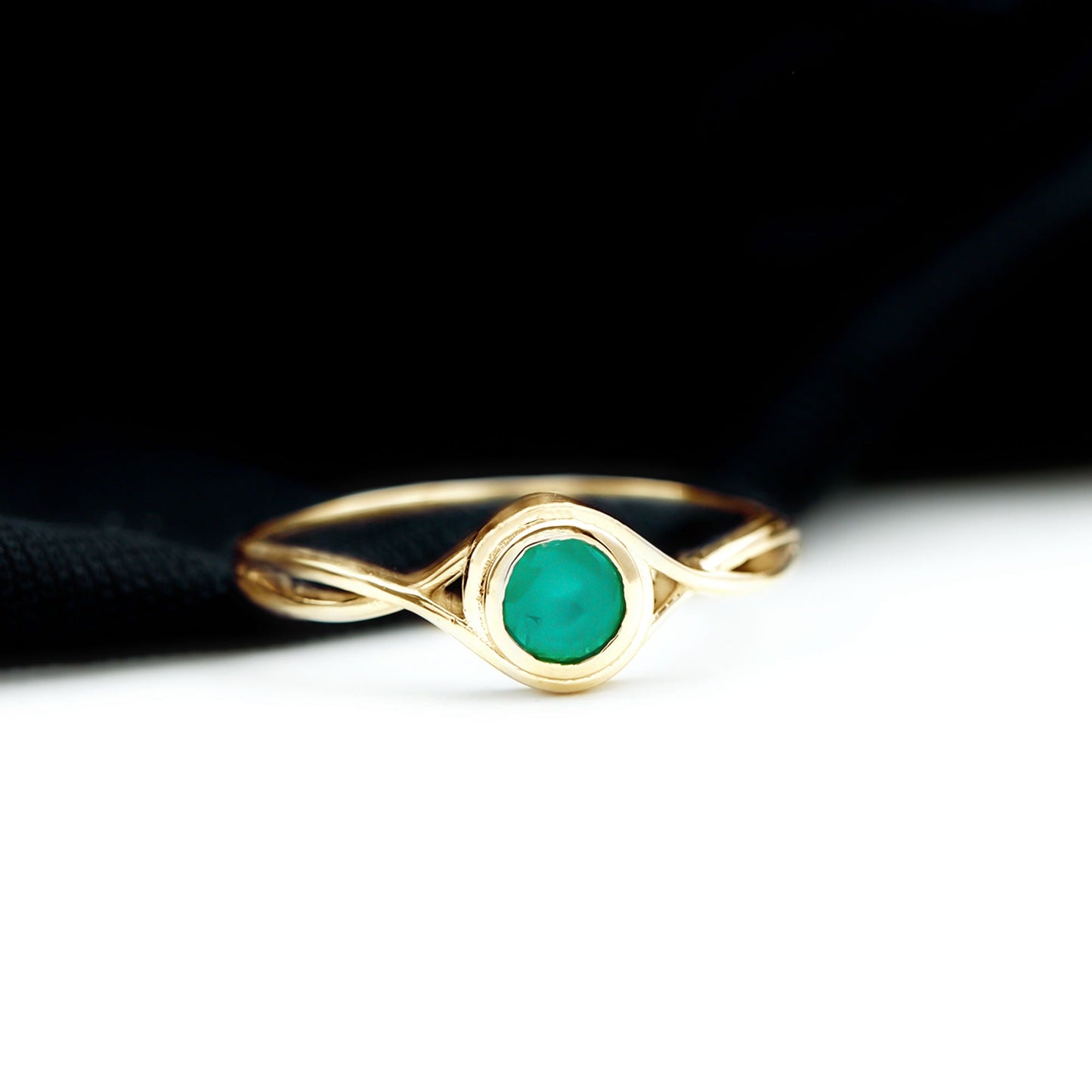 Round Cut Emerald Solitaire Ring with Crossover Band