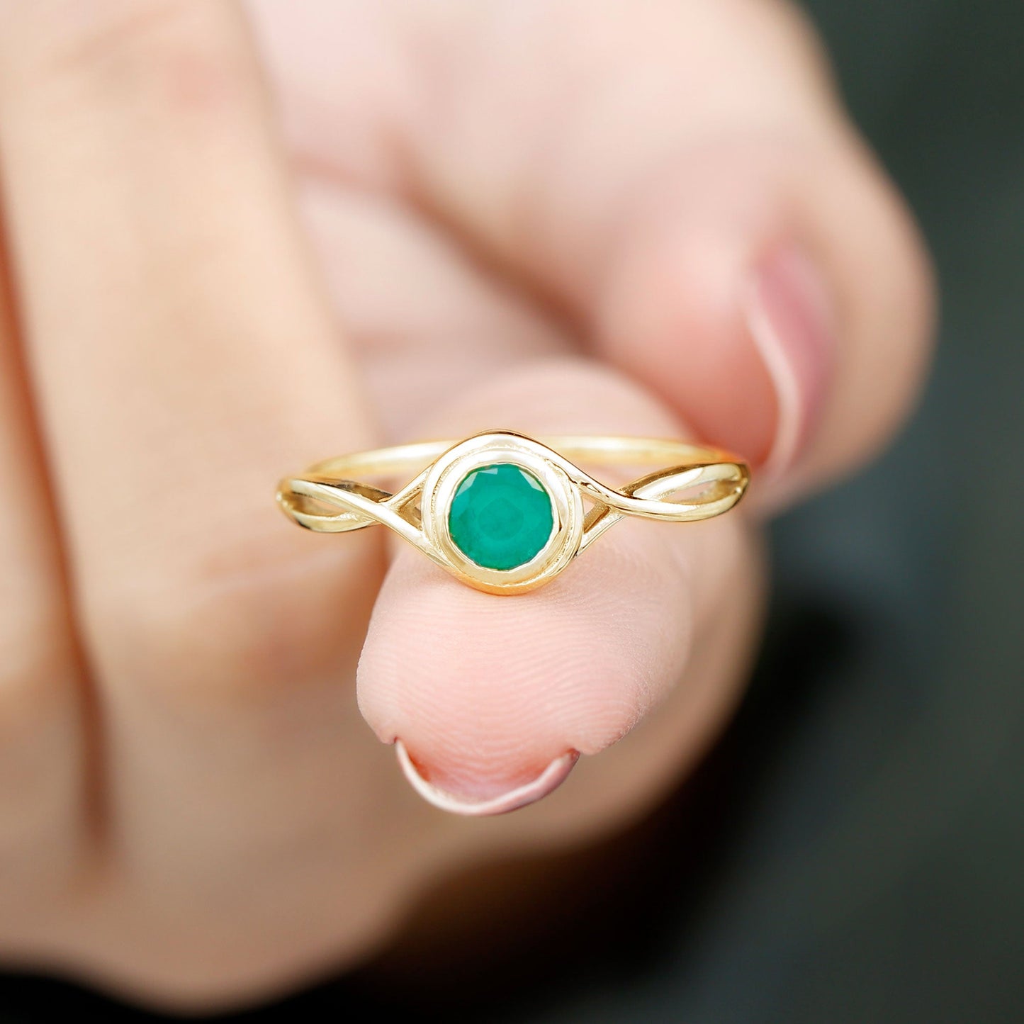 Round Cut Emerald Solitaire Ring with Crossover Band