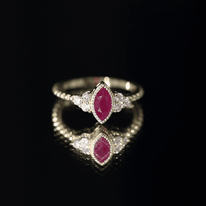 Vintage Style 0.75 Carat Ruby Marquise Engagement Ring with Diamond Trio