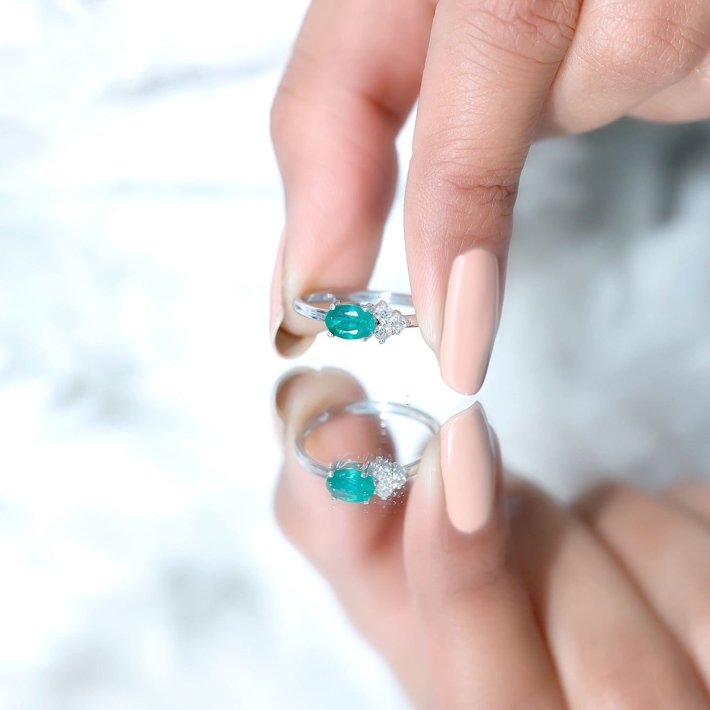 AAA Quality Oval Cut Emerald East West Promise Ring with Diamond Trio