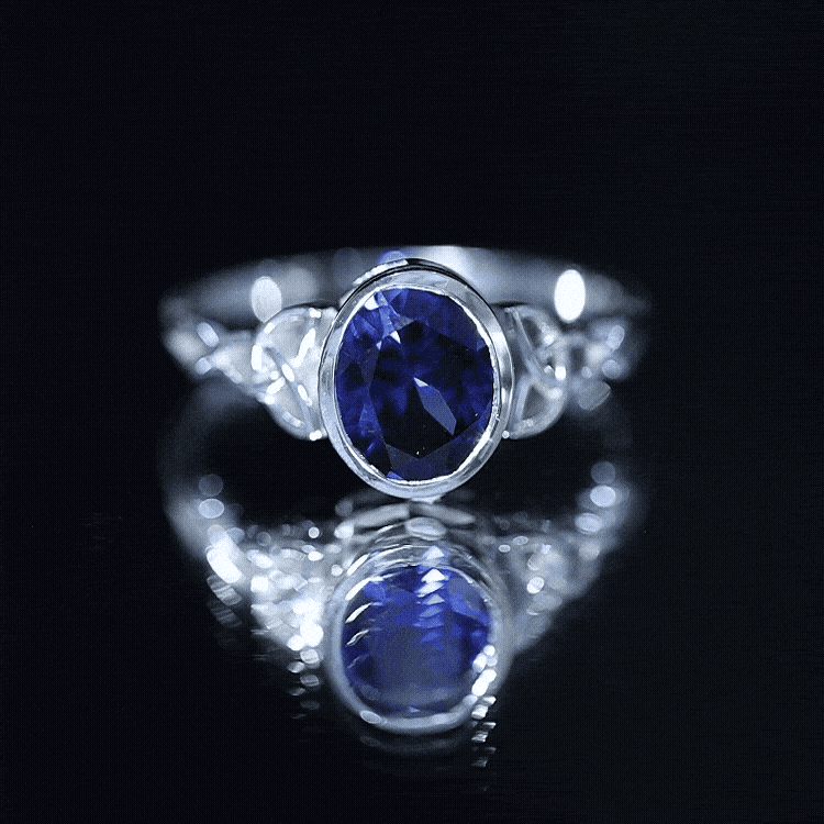 Certified 4 Carat Oval Lab Grown Blue Sapphire Bezel Set Engagement Ring