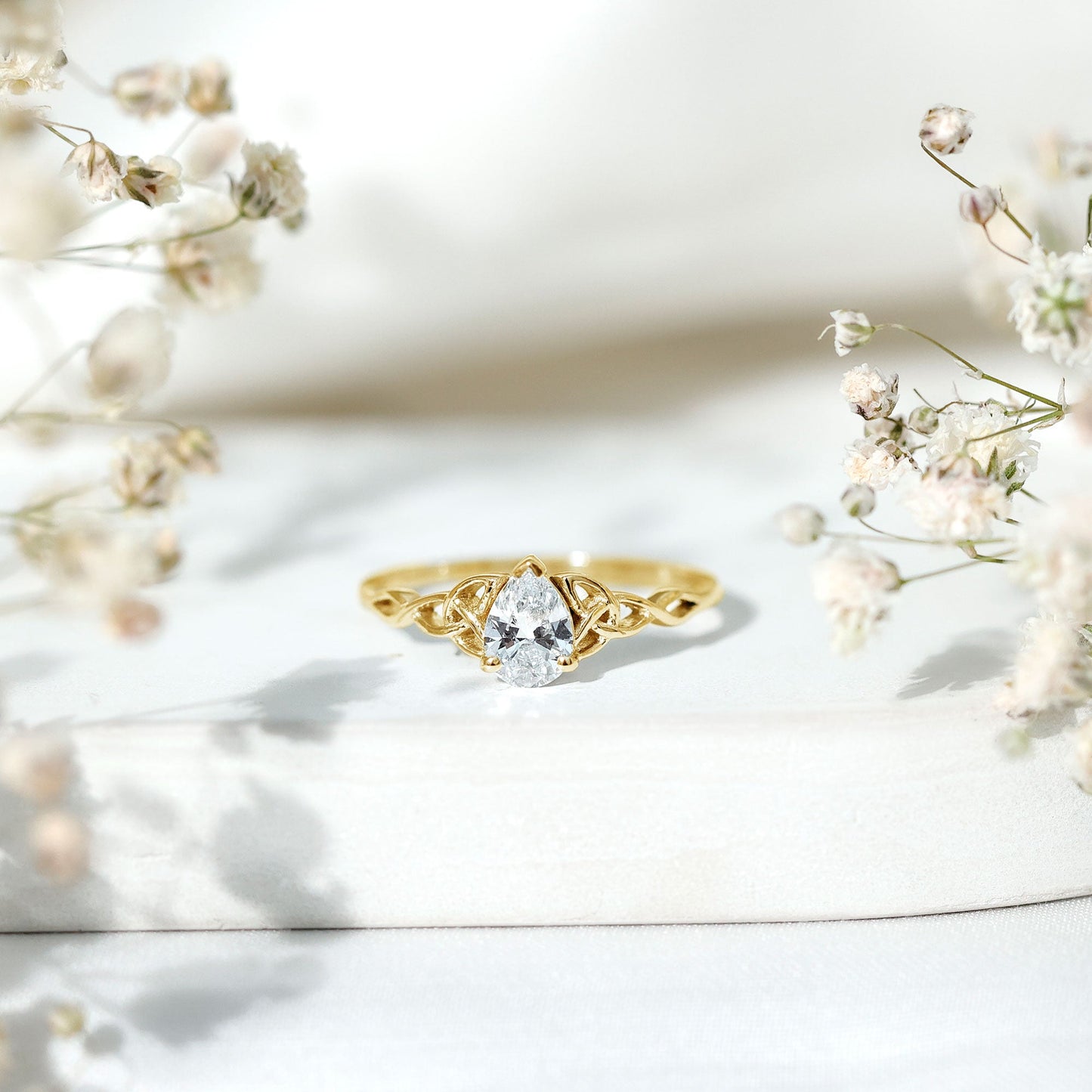Pear Cut 0.79 Carat Moissanite Celtic Engagement Ring