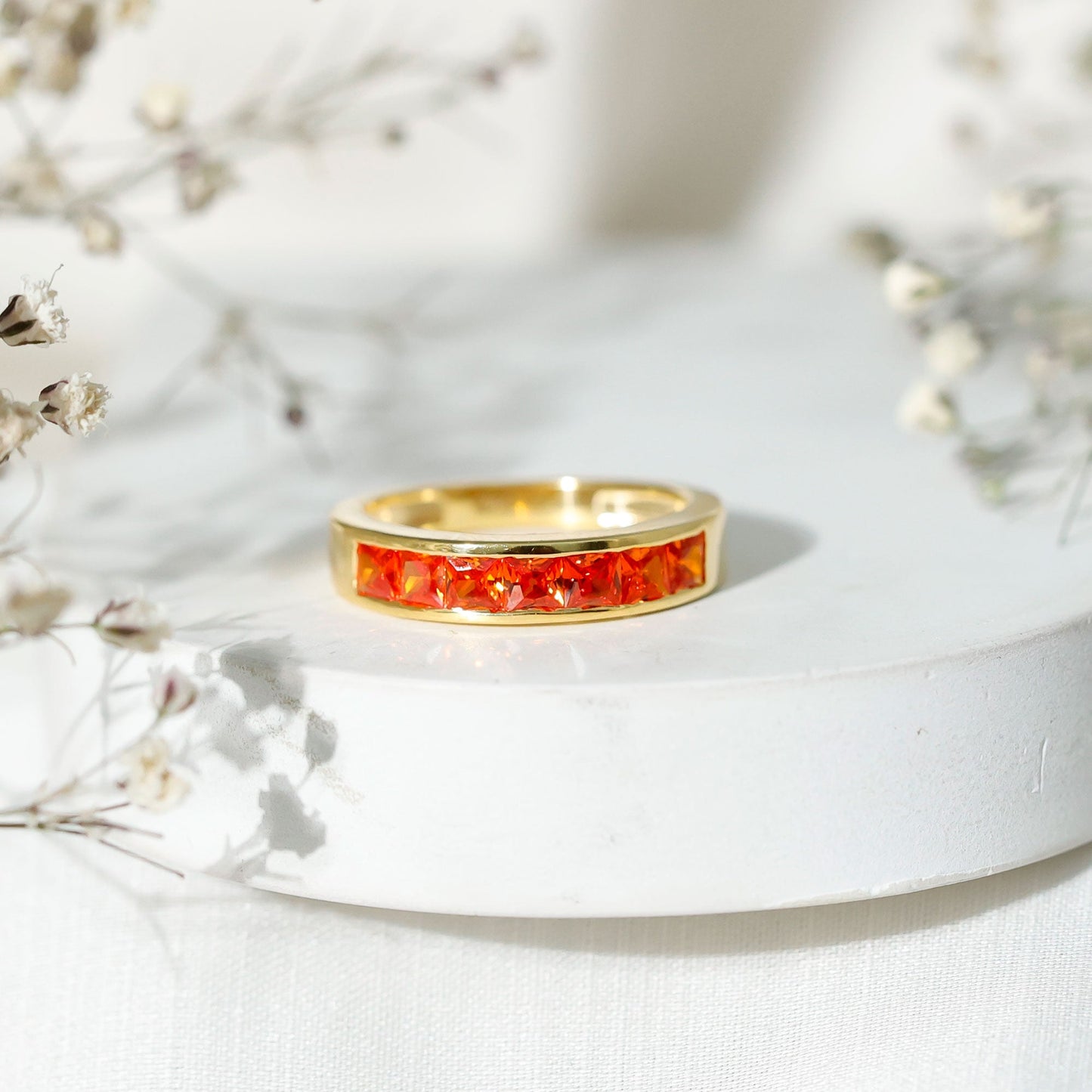 Princess Cut Lab Grown Orange Sapphire Half Eternity Band in Channel Set