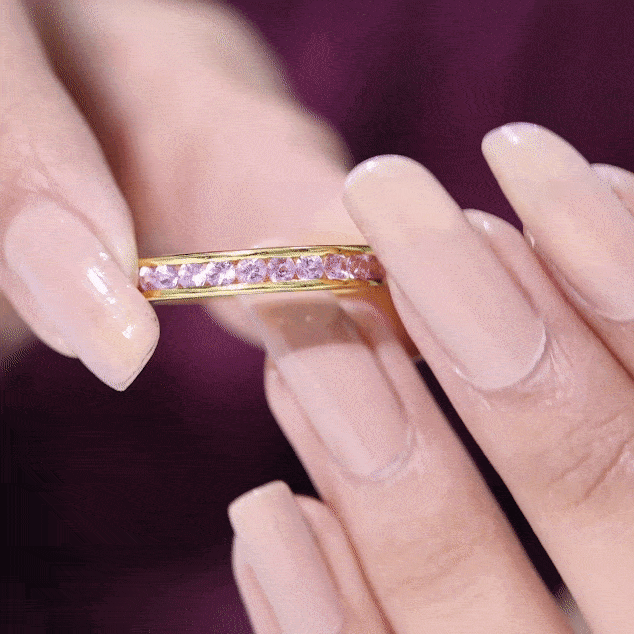 Round Lab Created Pink Sapphire Half Eternity Band in Channel Setting