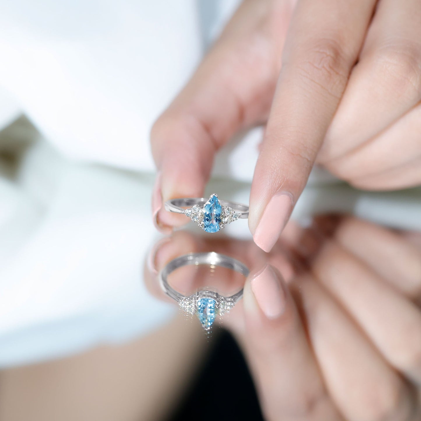 1 Carat Aquamarine Pear Engagement Ring with Diamond Trio