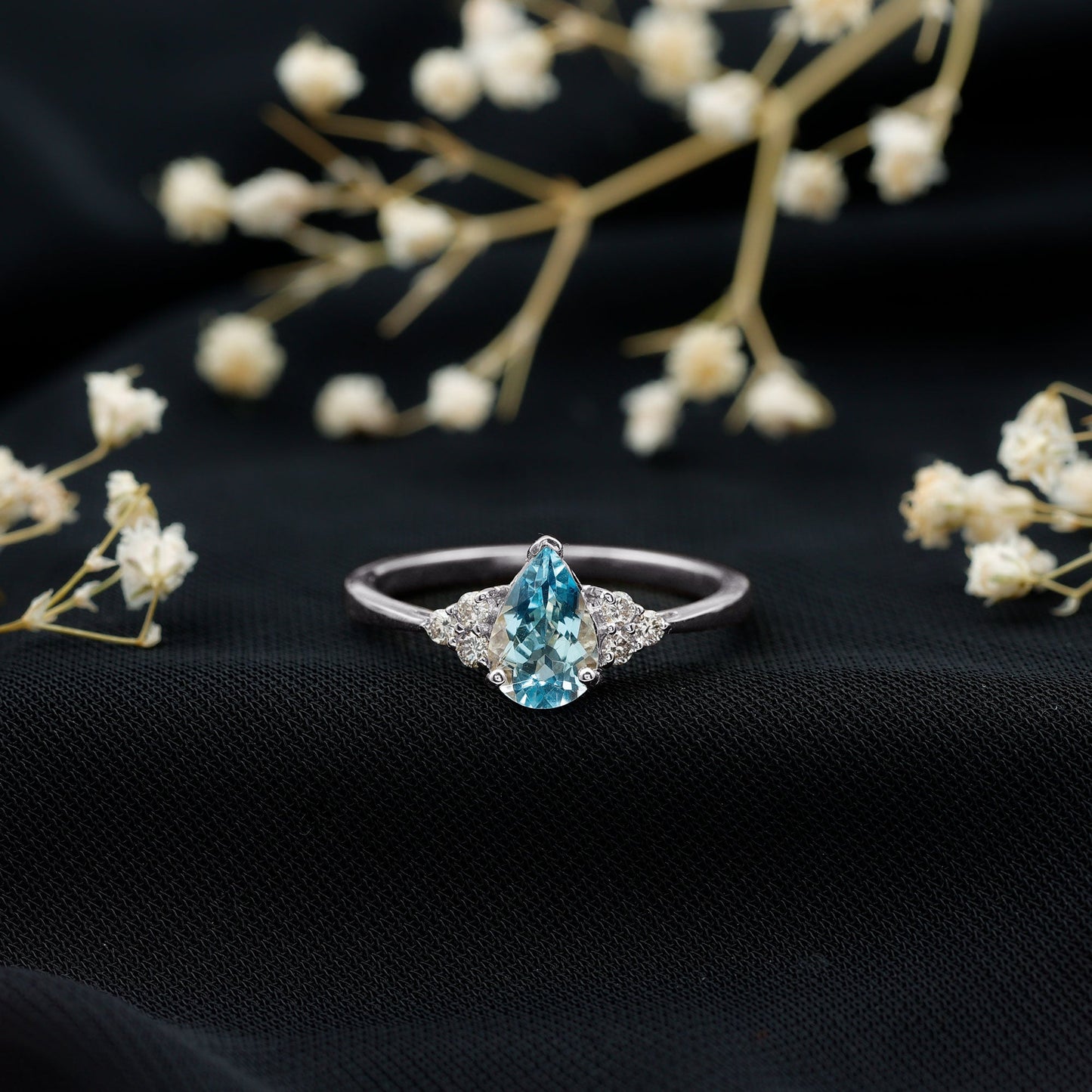 1 Carat Aquamarine Pear Engagement Ring with Diamond Trio