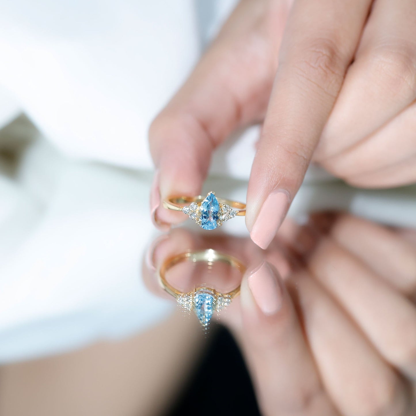 1 Carat Aquamarine Pear Engagement Ring with Diamond Trio