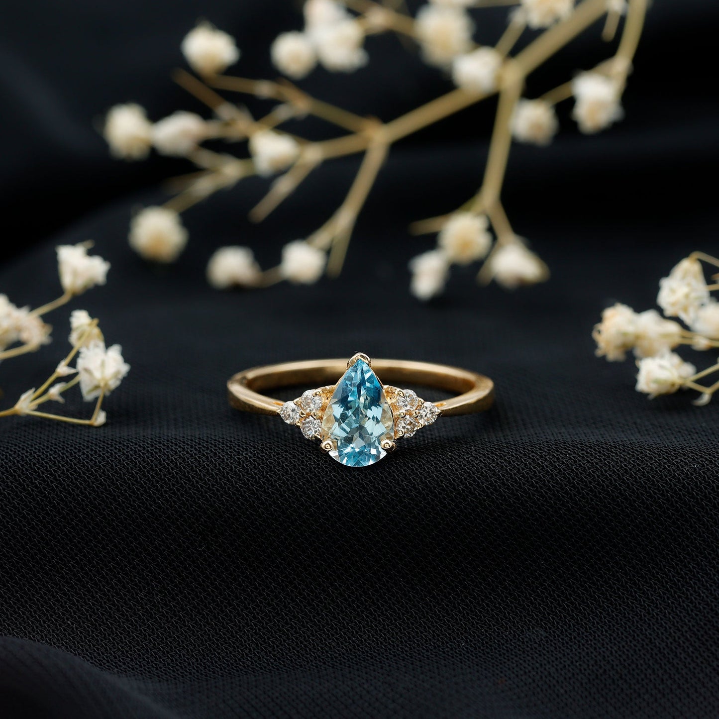1 Carat Aquamarine Pear Engagement Ring with Diamond Trio