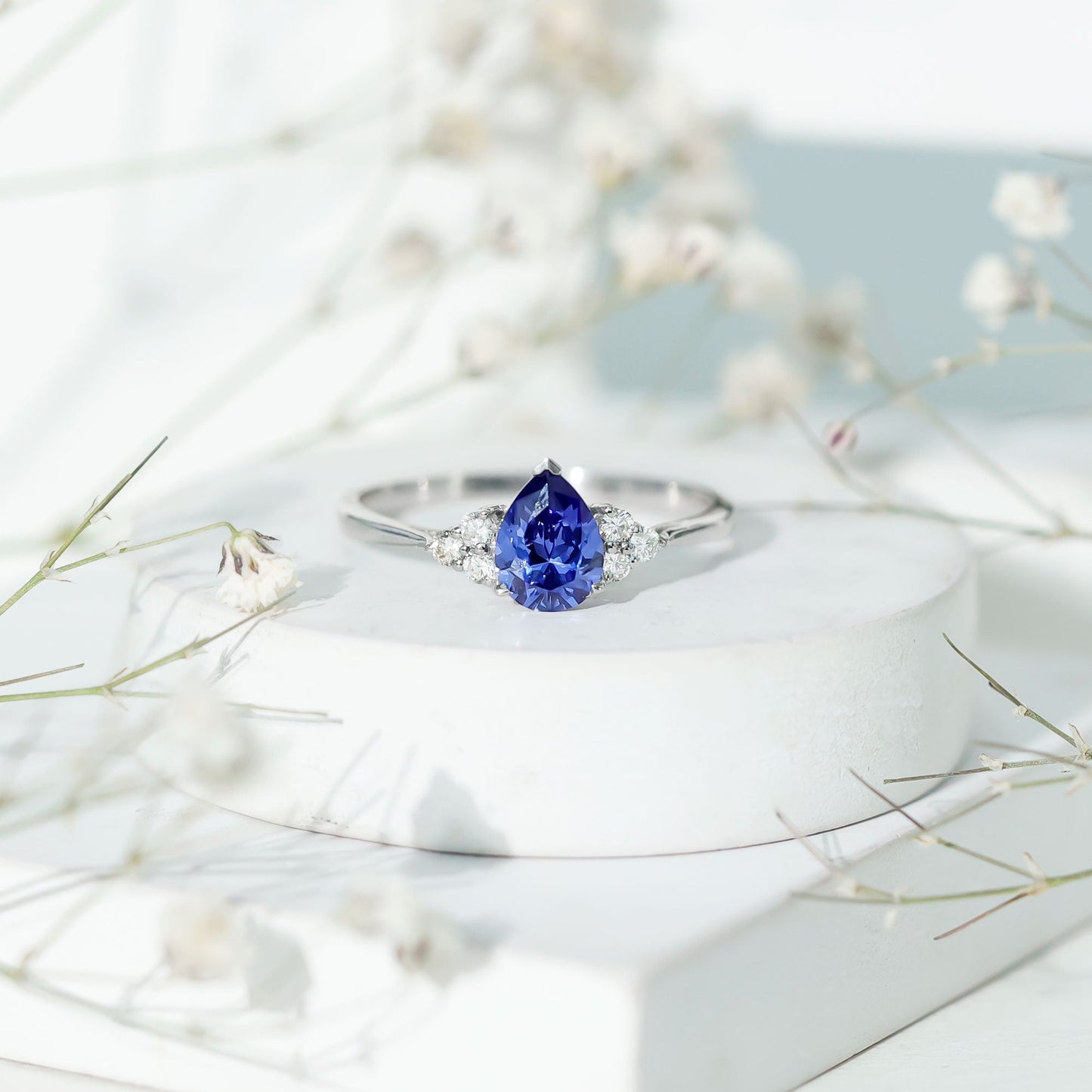 1.6 Carat Lab Blue Sapphire Teardrop Engagement Ring with Diamond Trio