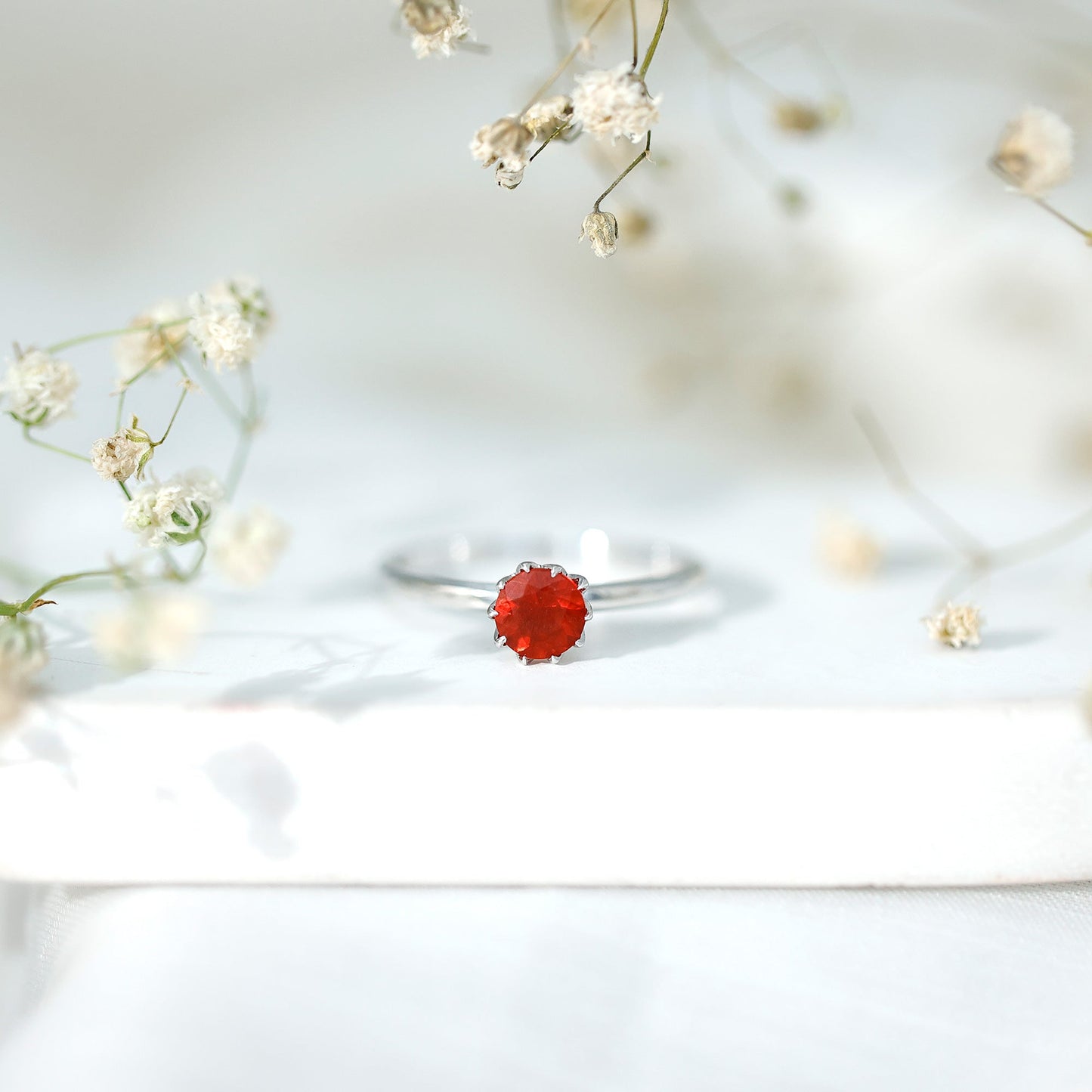 0.75 Carat Round Fire Opal Solitaire Ring in Lotus Basket Setting