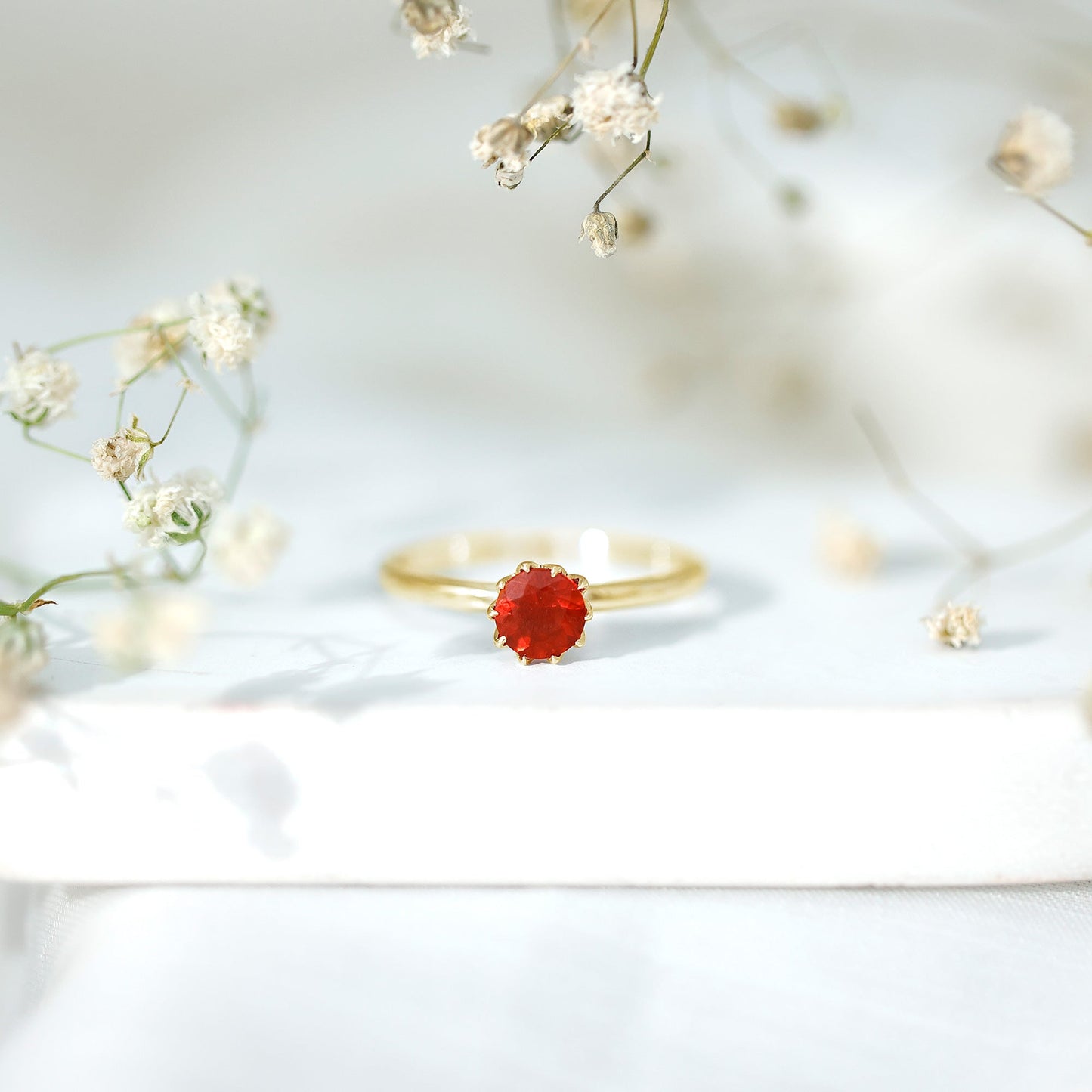 0.75 Carat Round Fire Opal Solitaire Ring in Lotus Basket Setting