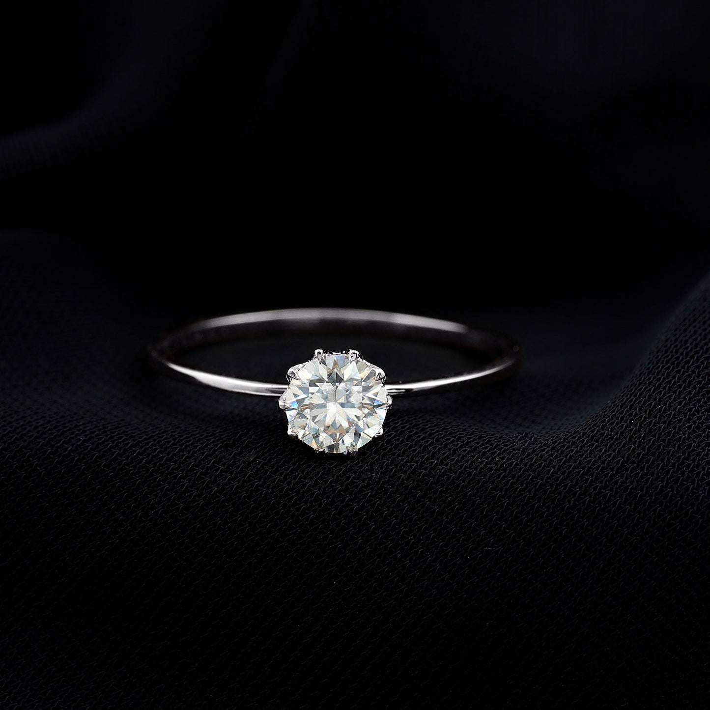 0.9 Carat Moissanite Solitaire Ring in Lotus Basket Setting