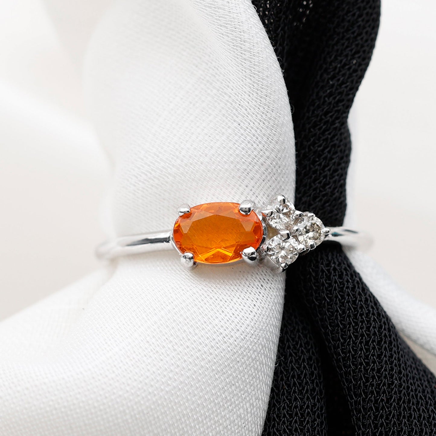 Oval Cut Fire Opal Promise Ring with Diamond Trio