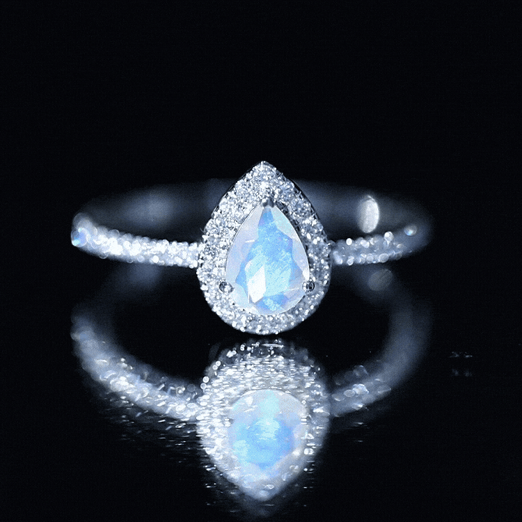 0.7 Carat Natural Ethiopian Opal Teardrop Engagement Ring with Diamond Halo