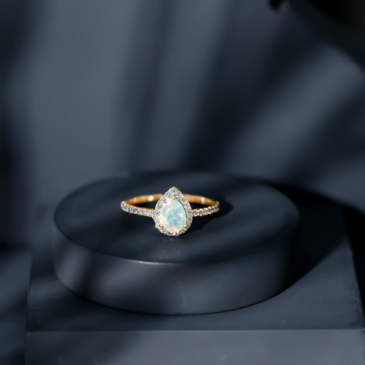 0.7 Carat Natural Ethiopian Opal Teardrop Engagement Ring with Diamond Halo