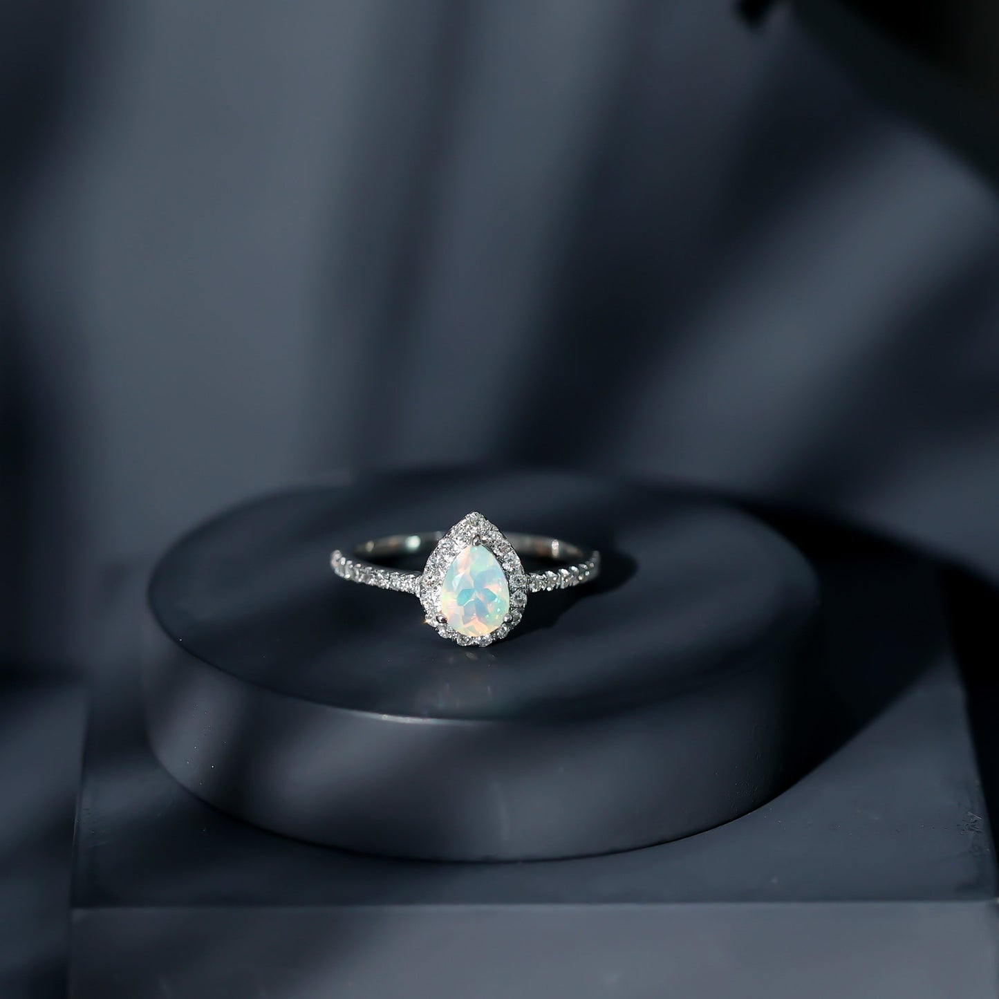 0.7 Carat Natural Ethiopian Opal Teardrop Engagement Ring with Diamond Halo