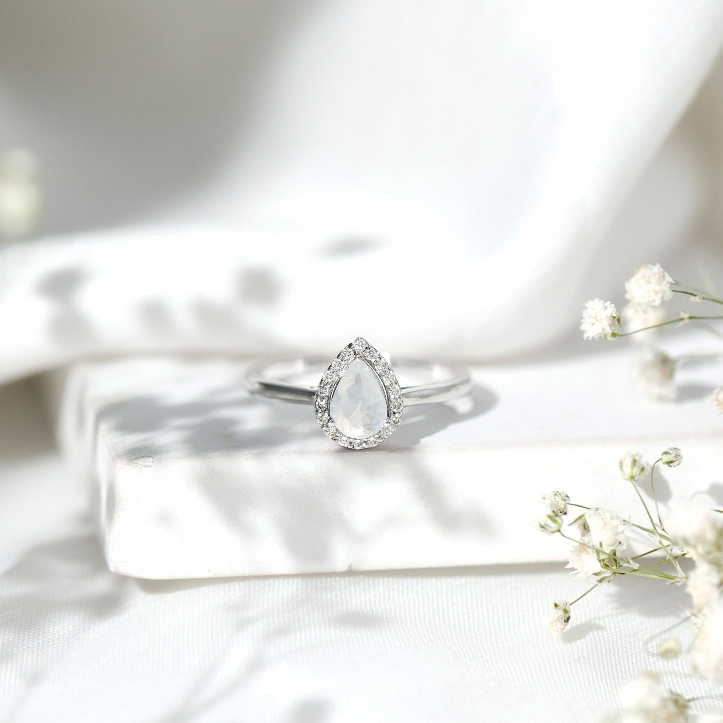 Pear Shaped Moonstone Halo Engagement Ring with Diamond