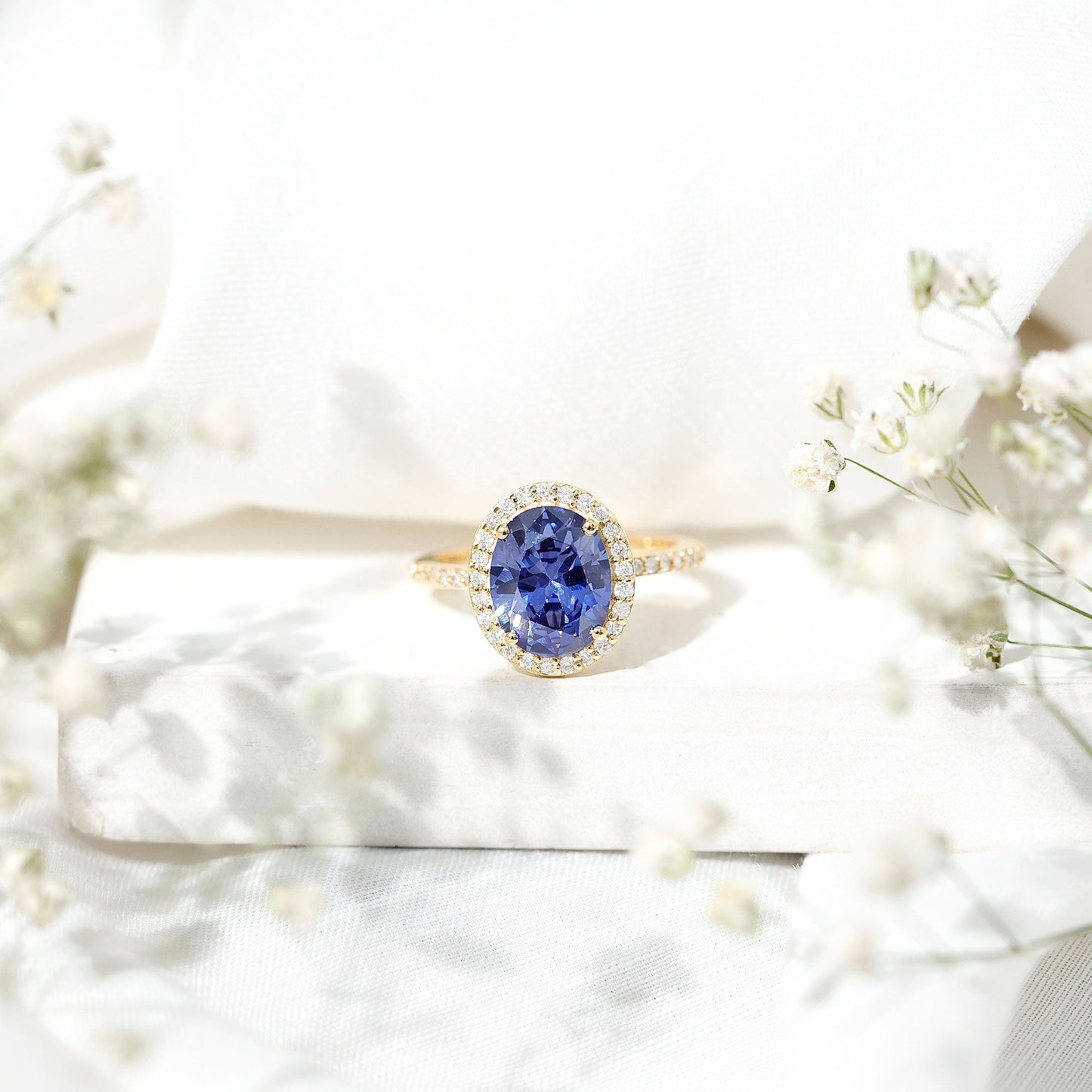 4 Carat Lab Grown Blue Sapphire Oval Engagement Ring with Diamond Halo