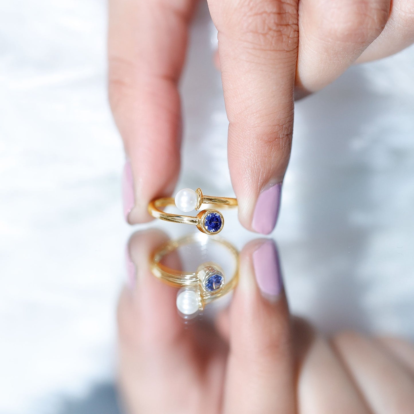 Lab Created Blue Sapphire and Pearl Toi Et Moi Ring