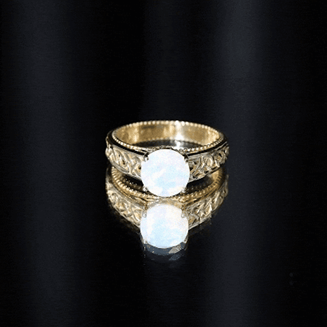 Ethiopian Opal Celtic Knot Engagement Ring with Surprise Diamond