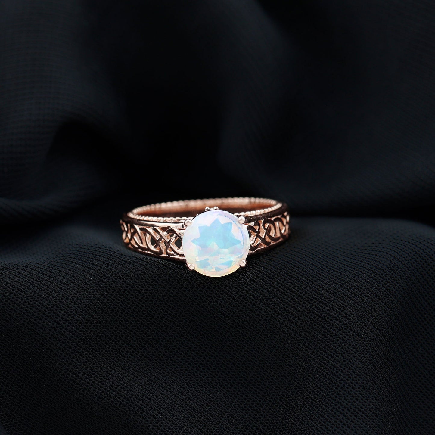 Ethiopian Opal Celtic Knot Engagement Ring with Surprise Diamond