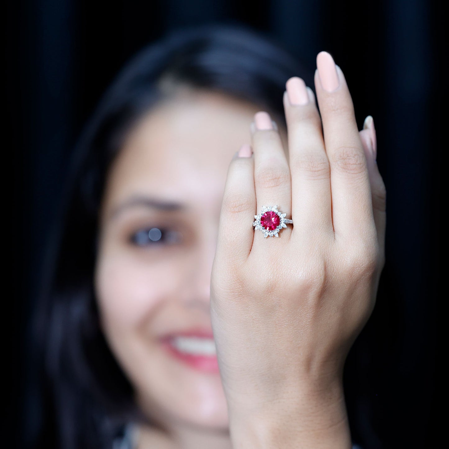 Lab Created Ruby and Diamond Halo Engagement Ring