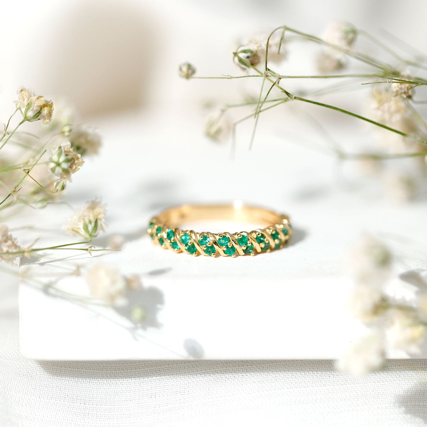 Unique Half Eternity Wedding Band with Round Emeralds