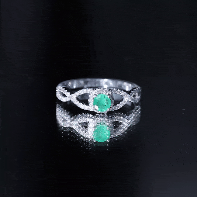 Real Emerald and Diamond Criss Cross Engagement Ring