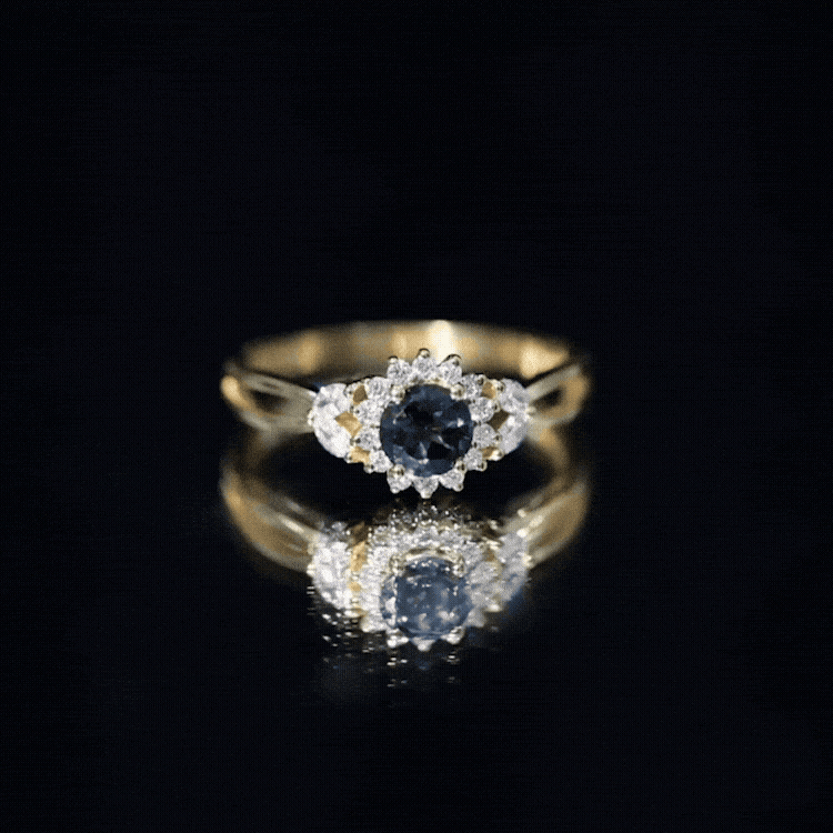 0.6 Carat London Blue Topaz Floral Engagement Ring with Diamond