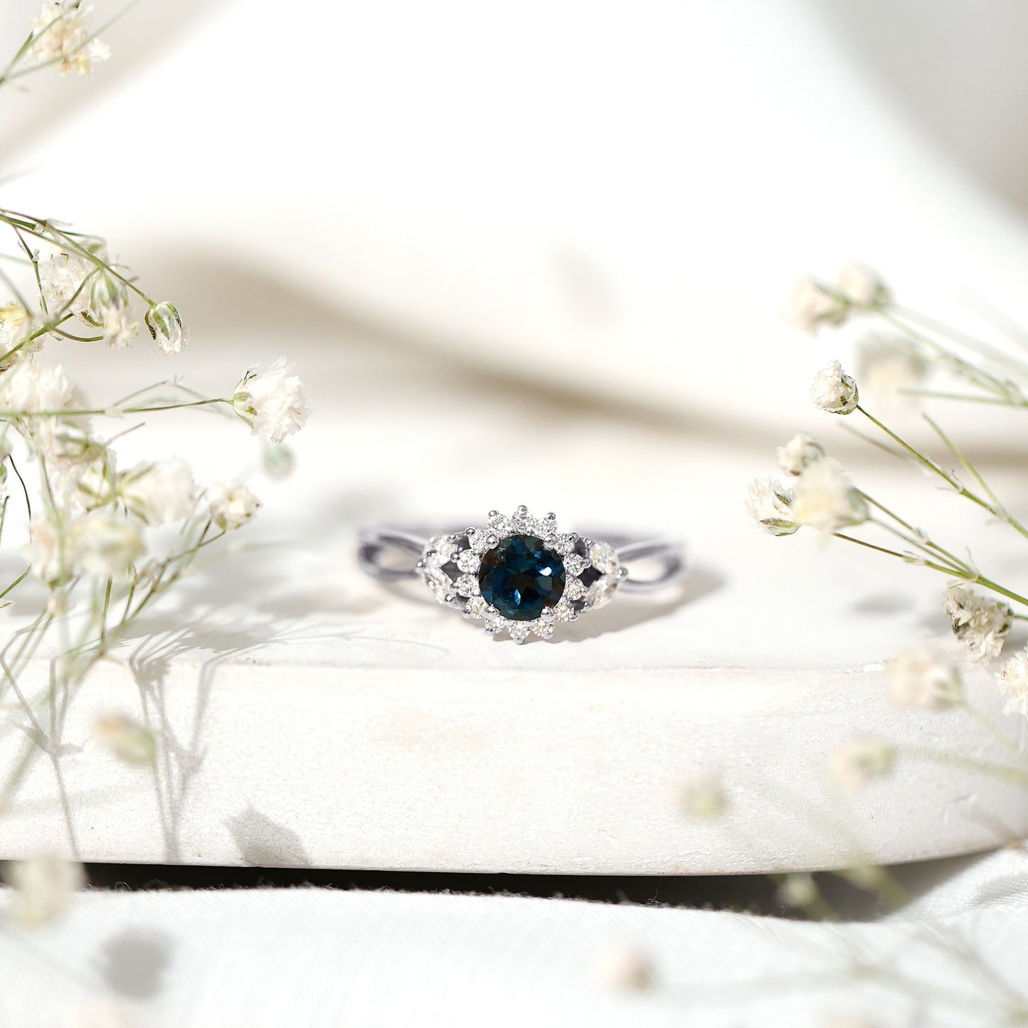 0.6 Carat London Blue Topaz Floral Engagement Ring with Diamond