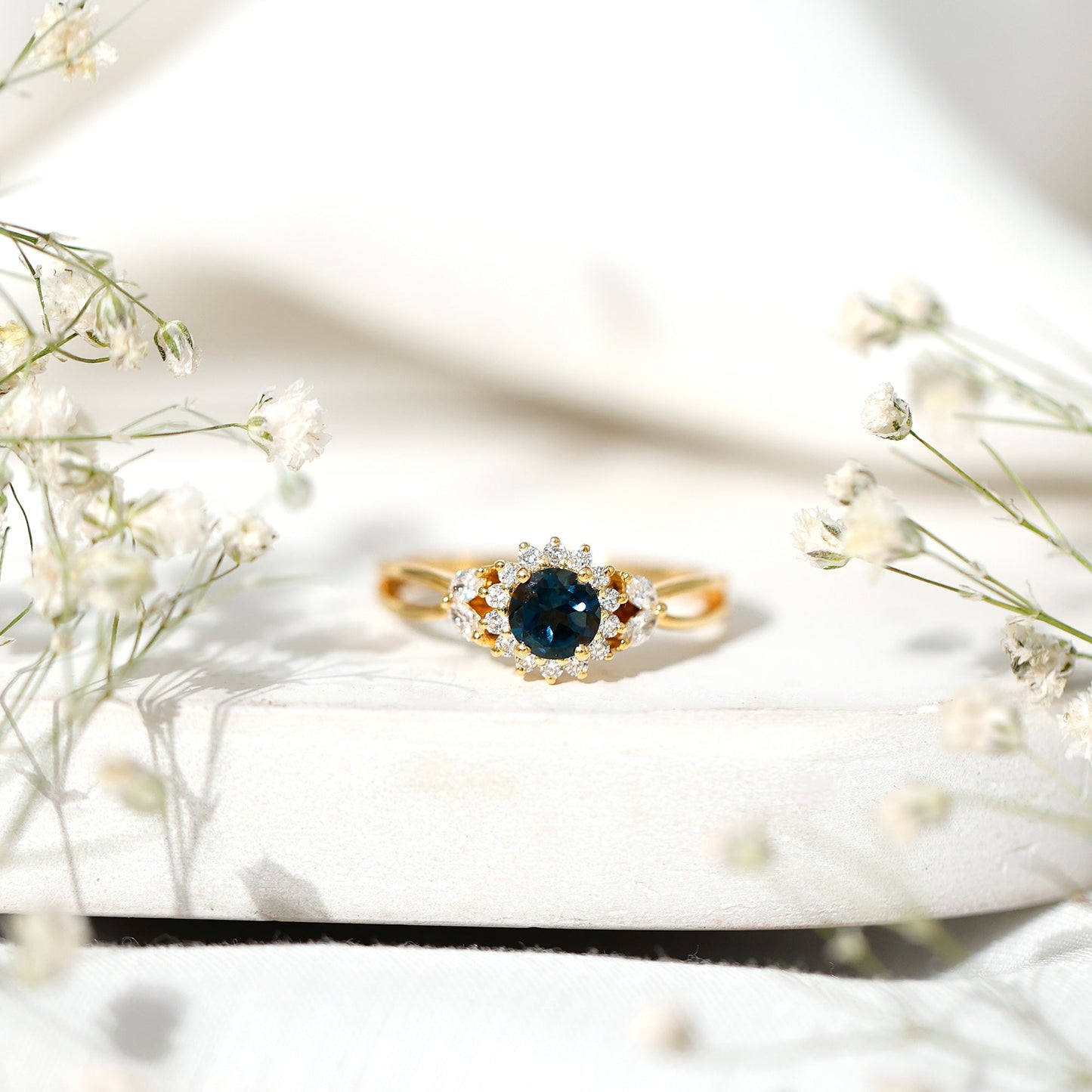 0.6 Carat London Blue Topaz Floral Engagement Ring with Diamond