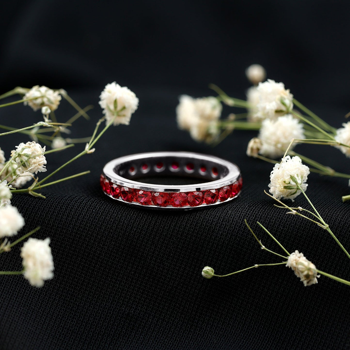 Round Created Ruby Full Eternity Ring in Channel Setting