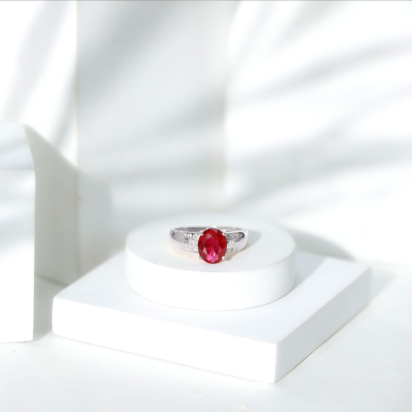Oval Lab Grown Ruby Statement Engagement Ring with Diamond